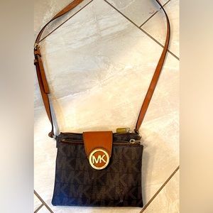 Used small Michael Kors cross body purse